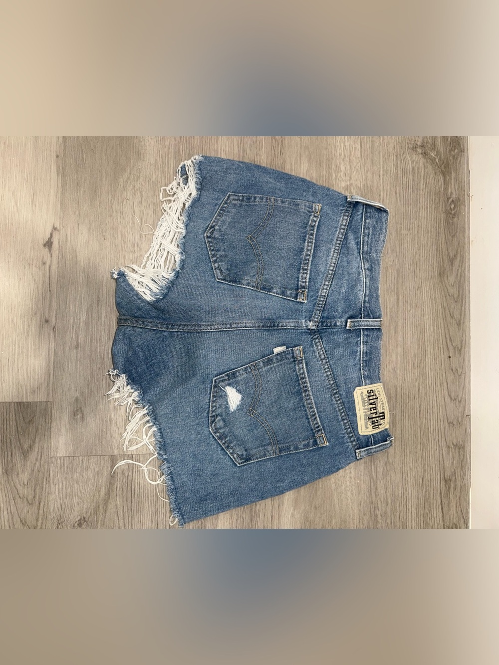 High-Rise Distressed Blue Denim Shorts Levis Silver Tab